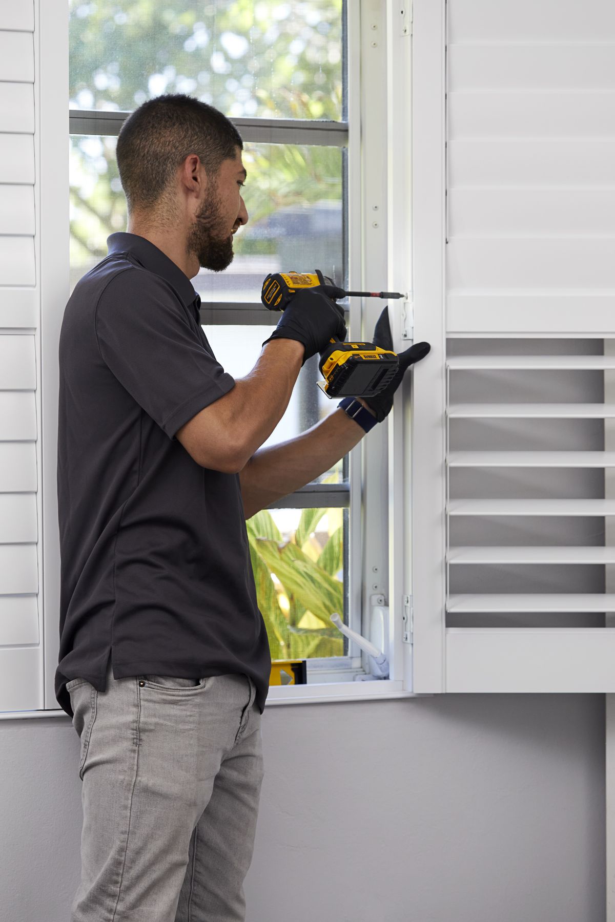 Blinds For You team installing blinds